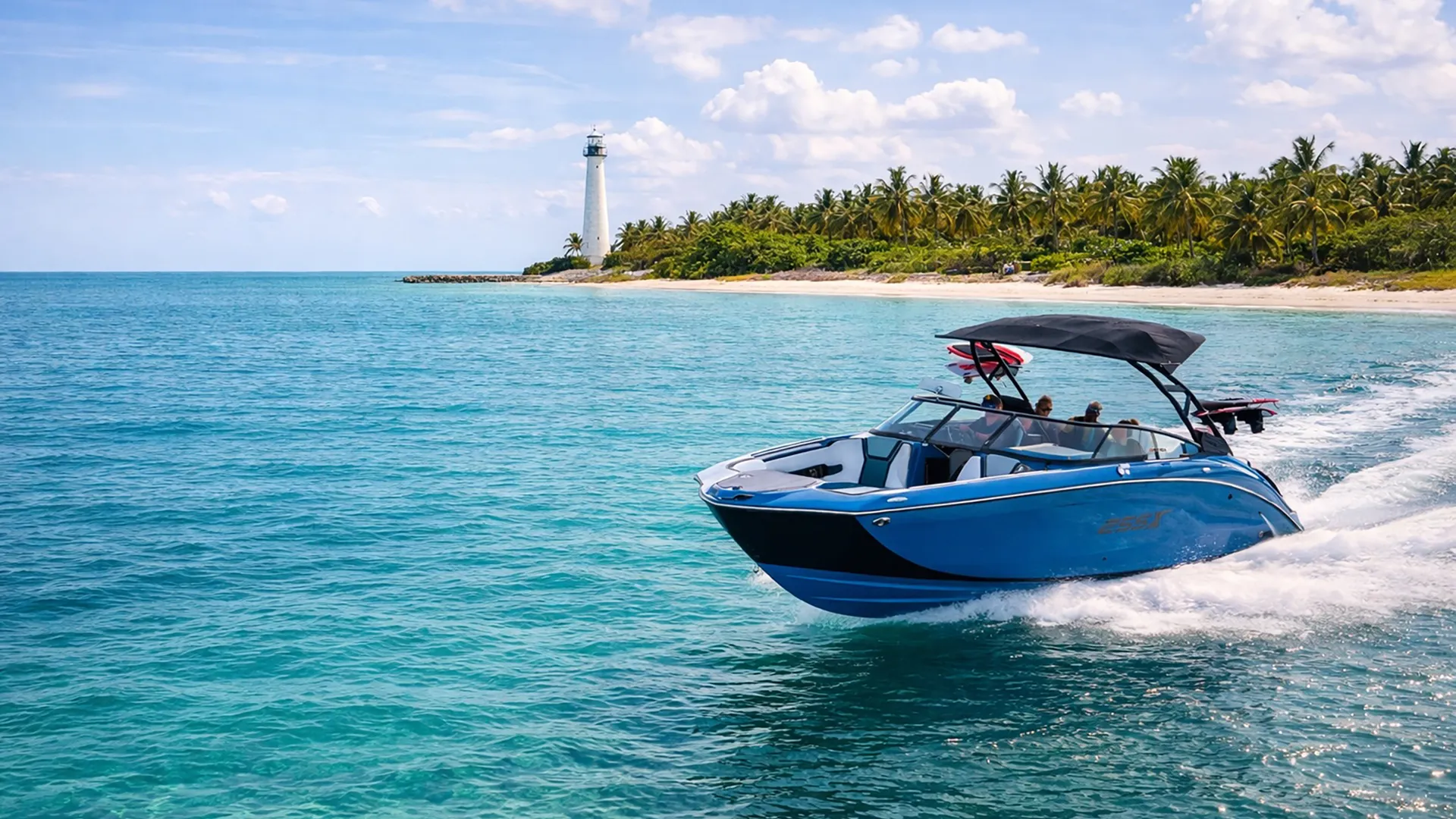 Private charter Yamaha 255XE near a Miami lighthouse at golden hour